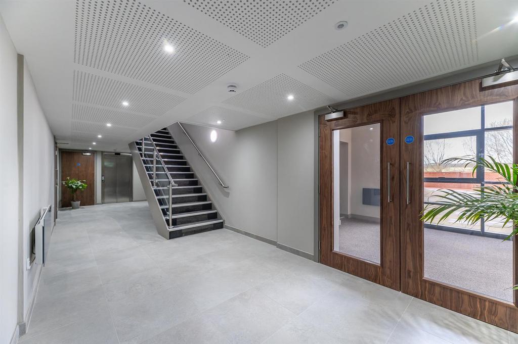 Entrance Lobby To Hallway, Stairs &amp; Elevator