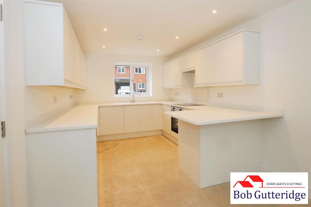 Open plan "l" shaped fitted kitchen/lounge/dining