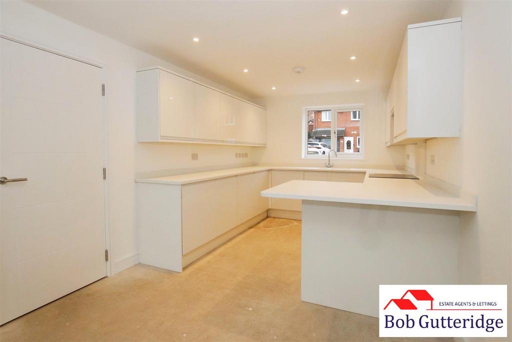 Open plan "l" shaped fitted kitchen/lounge/dining