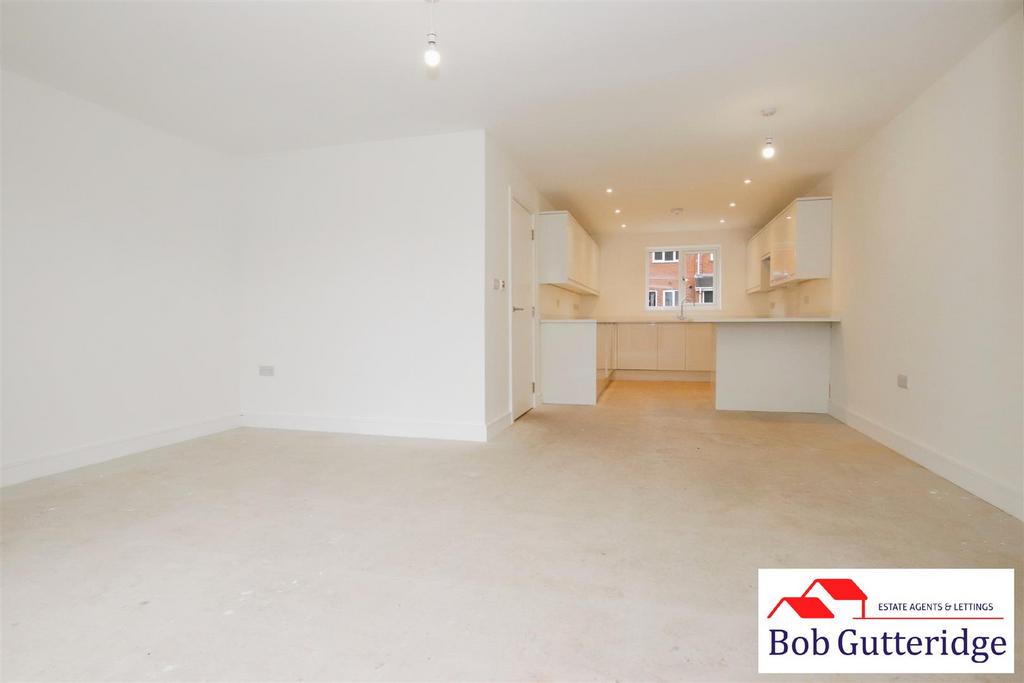 Open plan "l" shaped lounge/diner/fitted kitchen