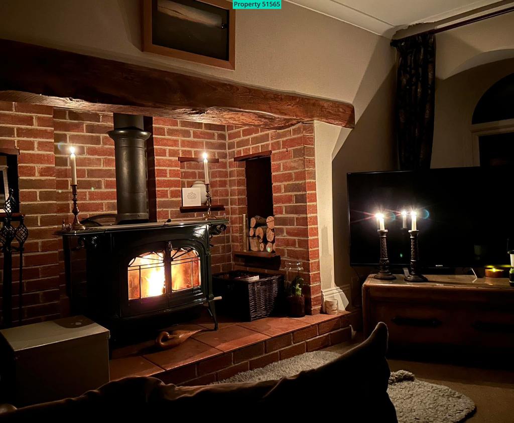 Inglenook Fireplace with log burner