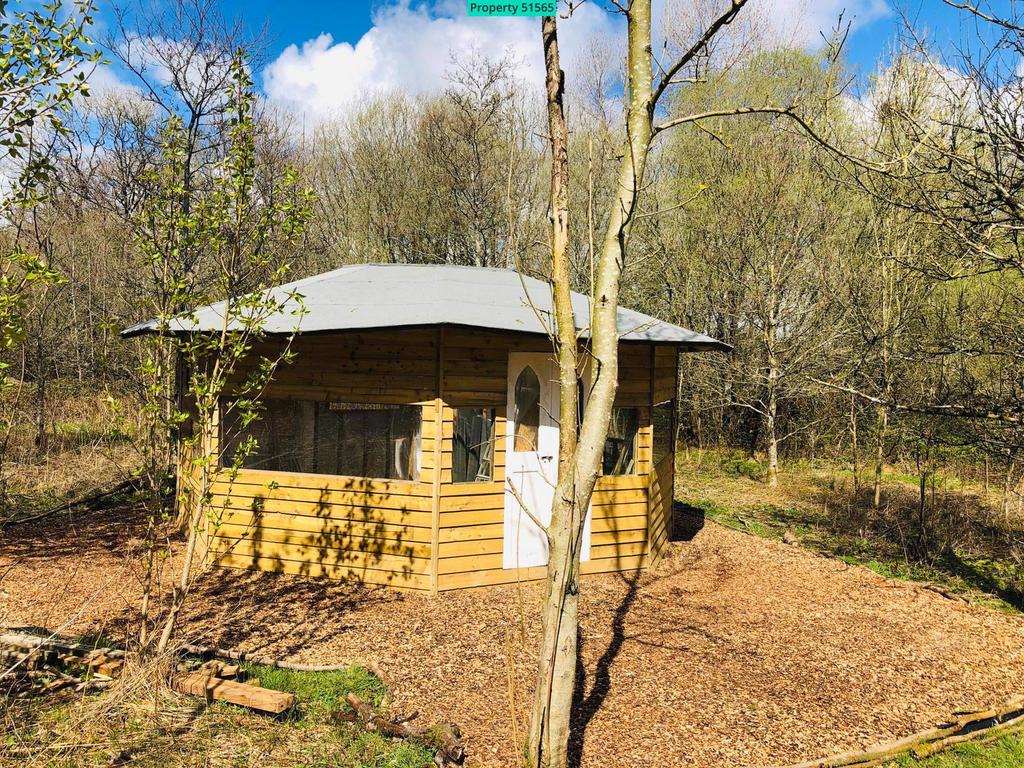 Summer house with wood burner