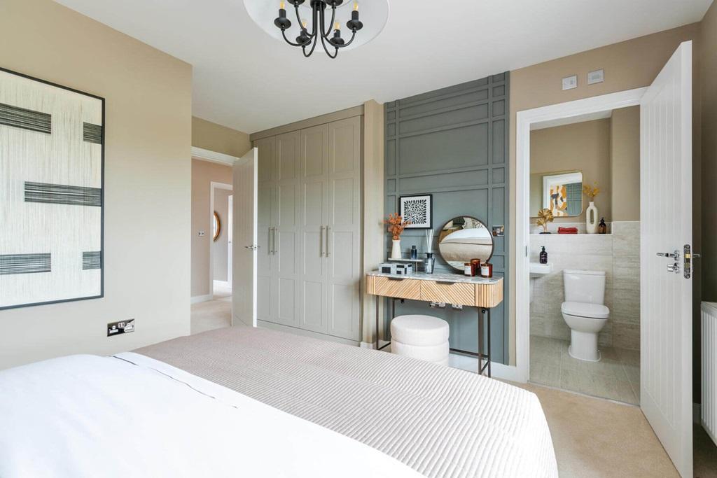 Bedroom 1 also hosts a private en suite shower...