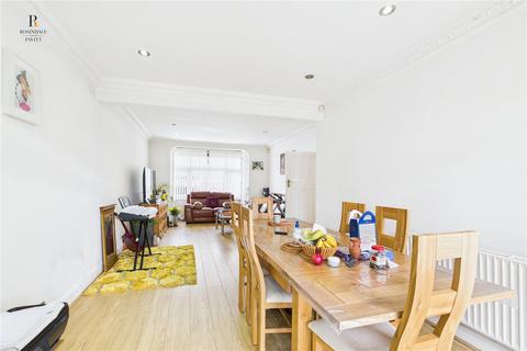 14 Gomshall Avenue, Wallington, SM6 8NY