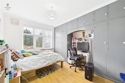 14 Gomshall Avenue, Wallington, SM6 8NY