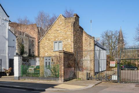 The Coach House, 136 Westbridge Road, London, SW11 3PF