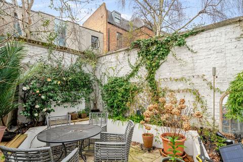 The Coach House, 136 Westbridge Road, London, SW11 3PF