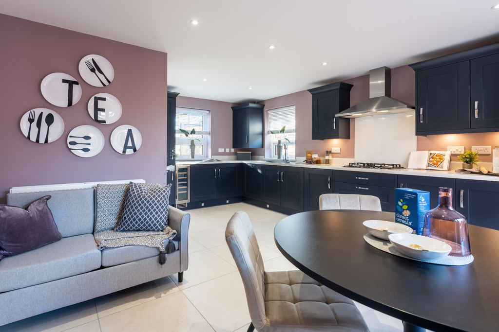 Open-plan kitchen diner with family seating...