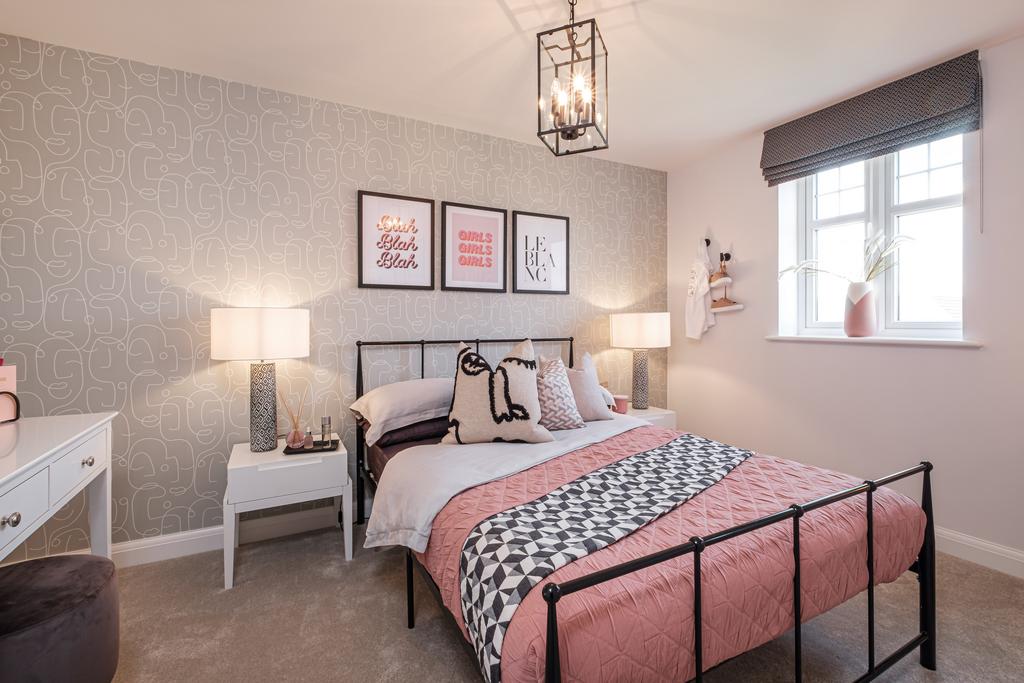 Double bedroom with a desk and large window