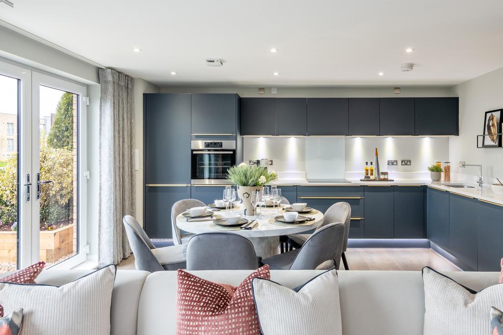 Open-plan living space in 3 bedroom apartment