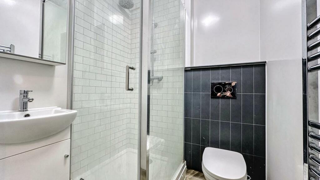 A modern and well-maintained bathroom featuring...