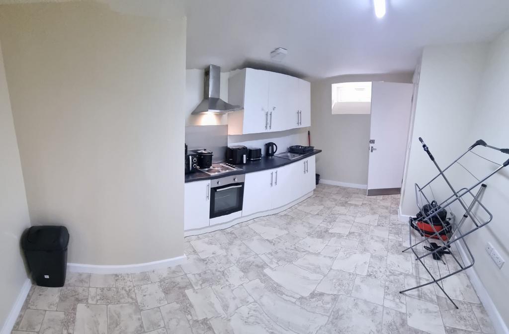 Bright and functional kitchen featuring ample c...