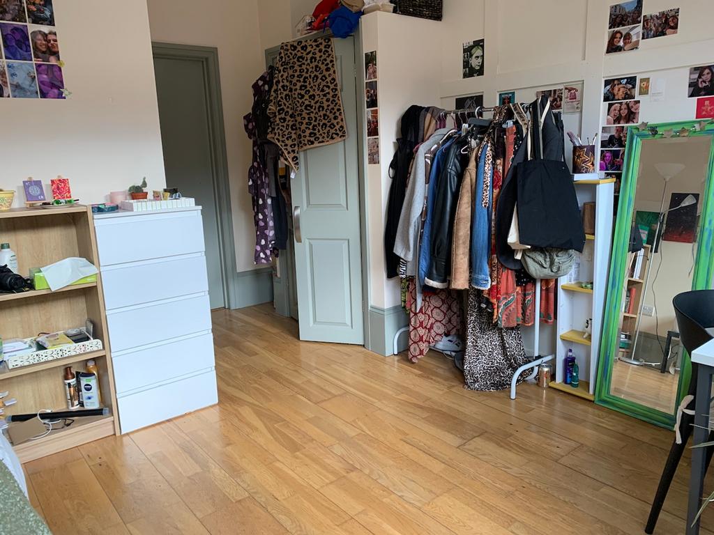 A bright and spacious double bedroom with ample...