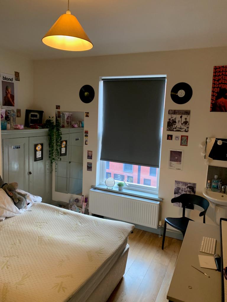 A stylish and inviting double bedroom with good...