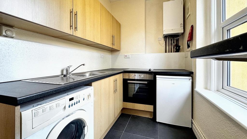 This well-maintained kitchen features modern ap...