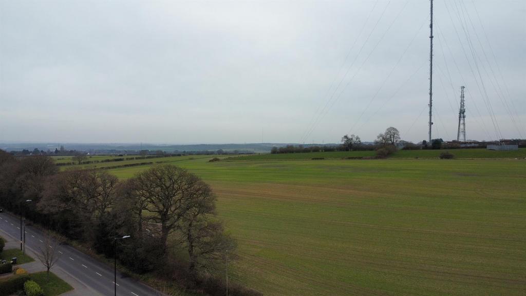 Aerial over fields.JPG