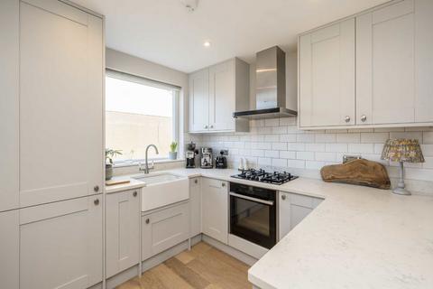 58 Briscoe Road, London, SW19 2AQ