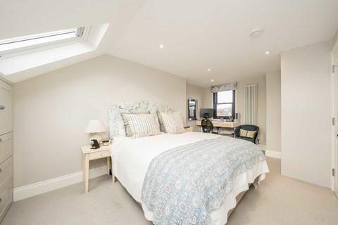 58 Briscoe Road, London, SW19 2AQ
