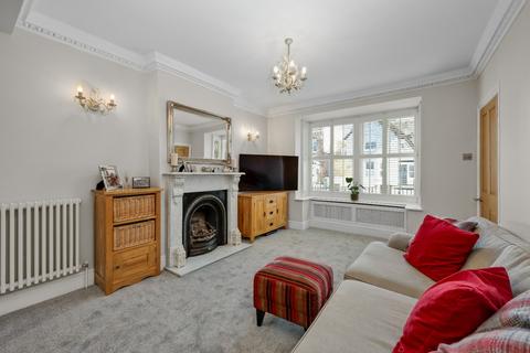 4 Manor Road, East Molesey, KT8 9JX