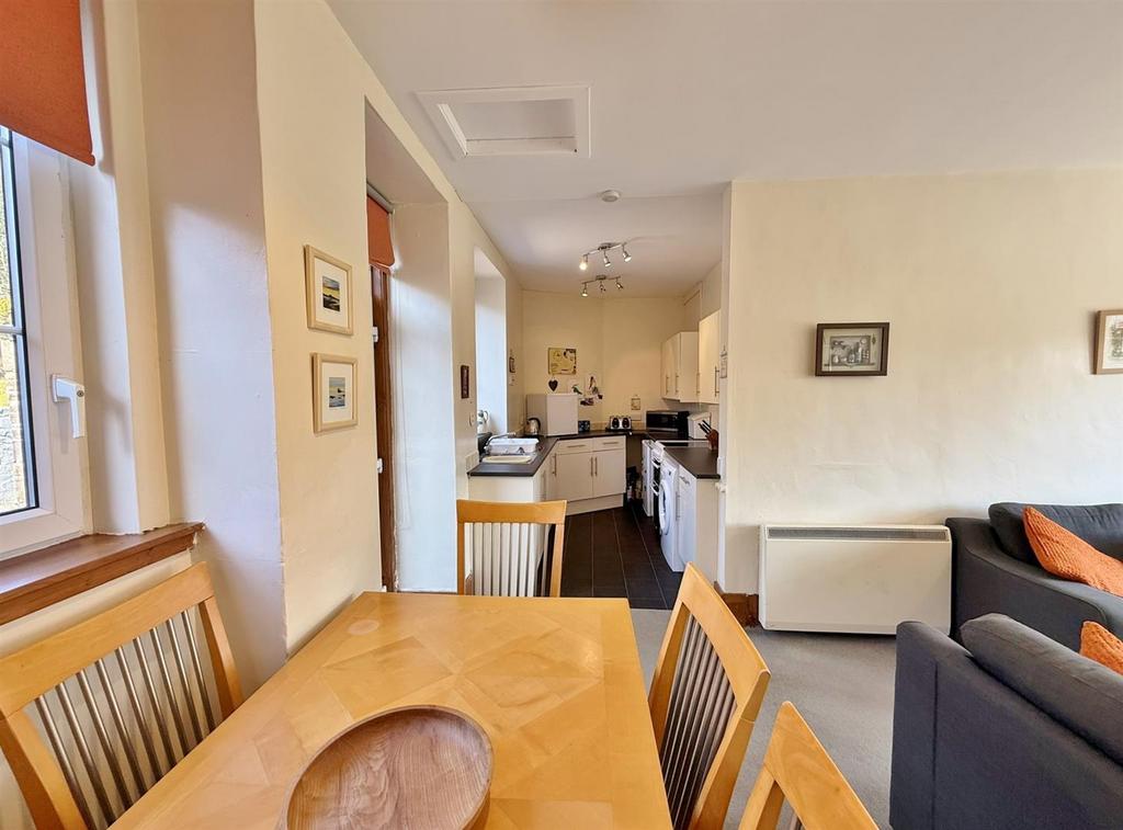 Dining table to kitchen area