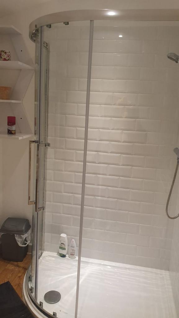 A modern and clean bathroom featuring a stylish...
