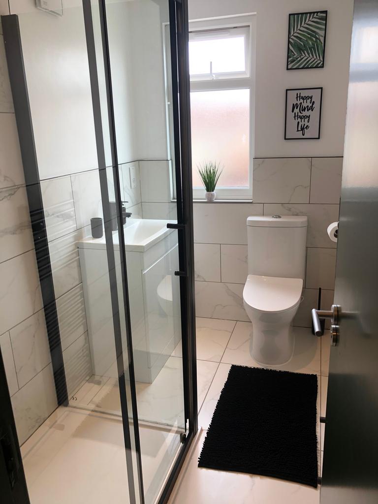 A modern and clean bathroom featuring a stylish...