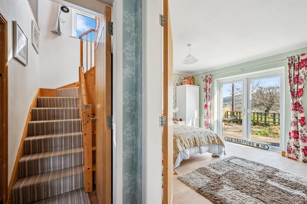 Bedroom One and stairs.jpg