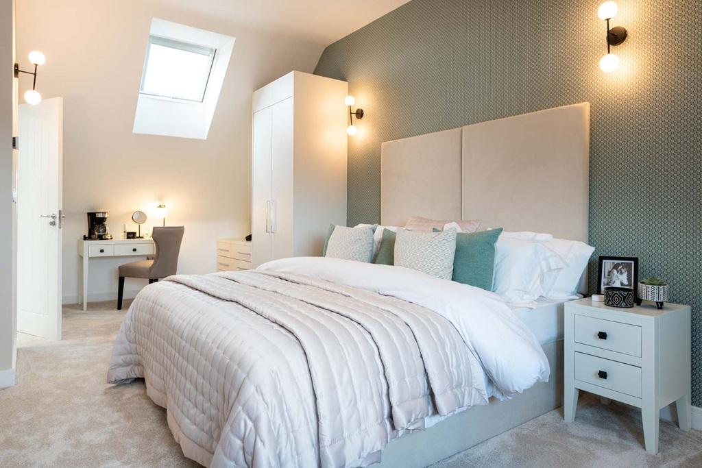 King-size bedroom enjoys seclusion on the...
