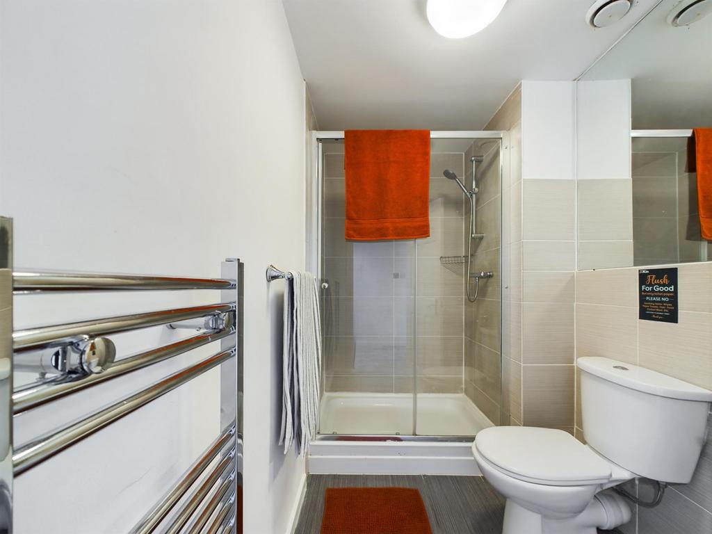 A modern and well-maintained bathroom featuring...
