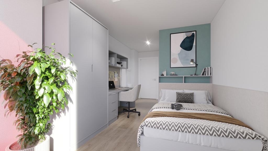 A bright and modern double bedroom featuring a ...