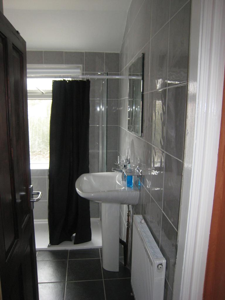 This stylish bathroom features contemporary fix...