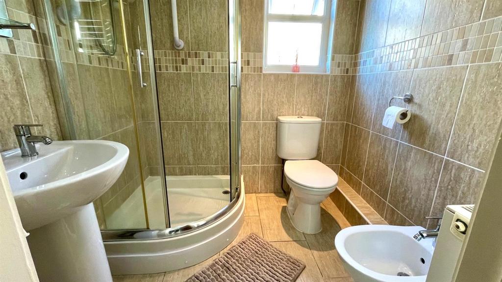 Tiled ground floor 4 piece shower room