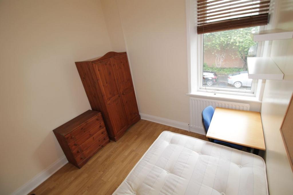 Bright and inviting double bedroom featuring a ...