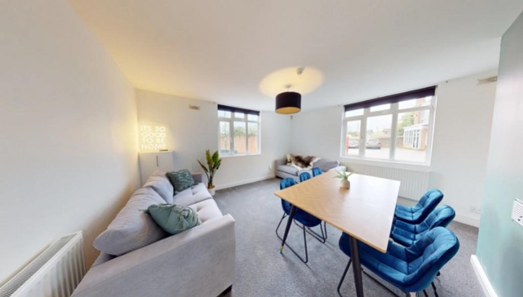 A spacious and inviting large modern living roo...