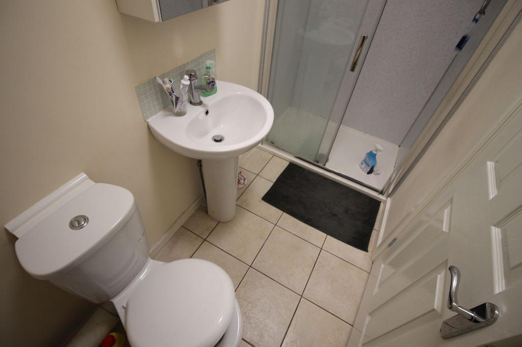 A well-maintained bathroom featuring a modern s...
