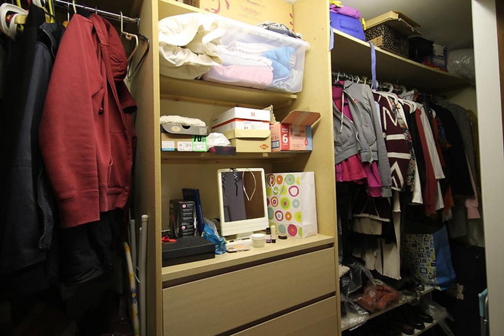 A well-organized storage space featuring shelve...