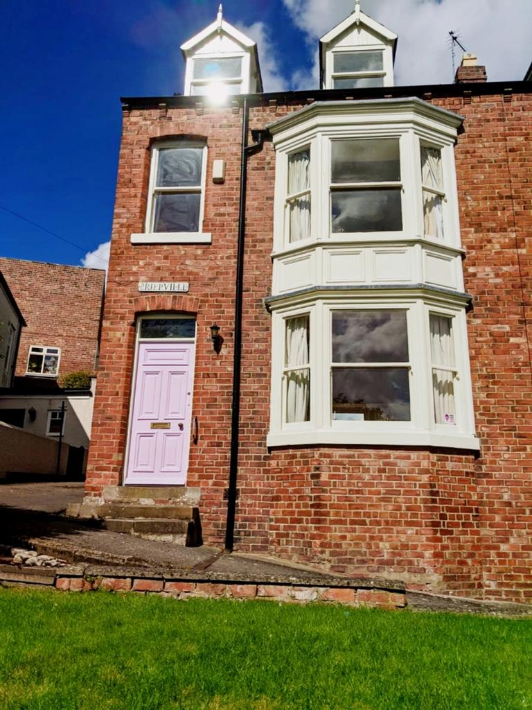 A charming exterior view of a well-maintained p...
