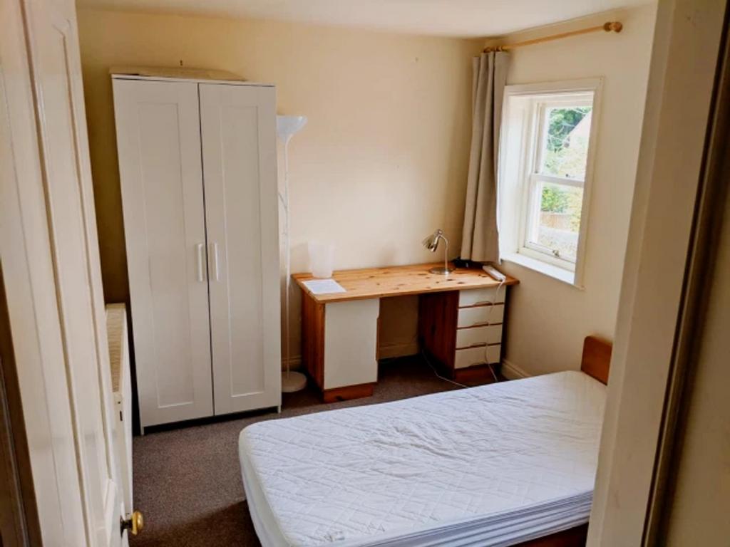 A bright and tidy double bedroom with ample nat...