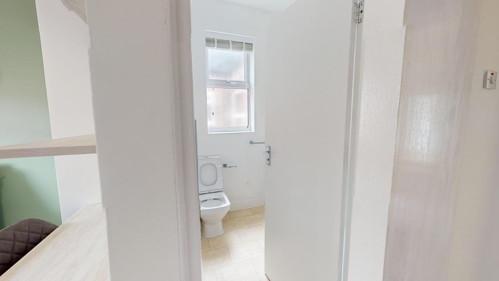 A clean and functional bathroom with good light...