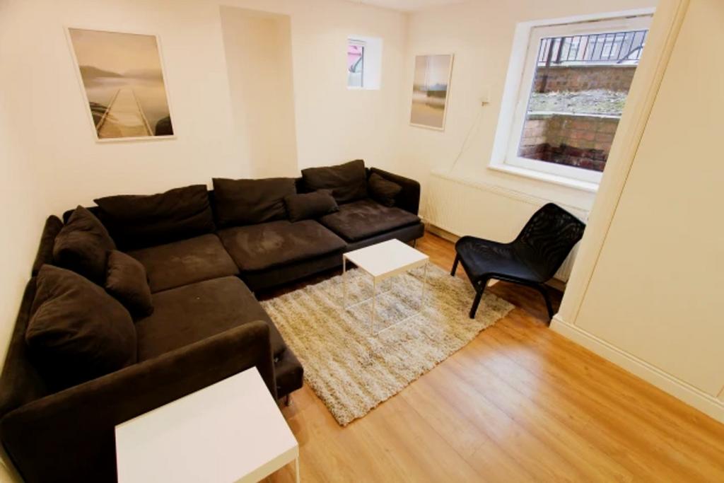 A spacious and stylish modern living room, perf...