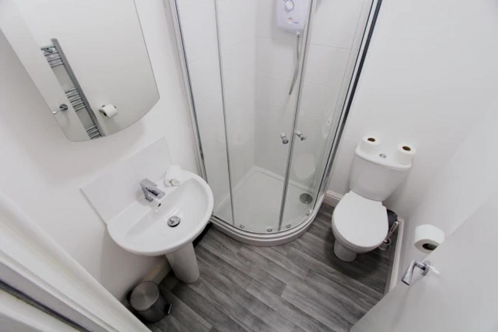 A modern and well-maintained bathroom featuring...
