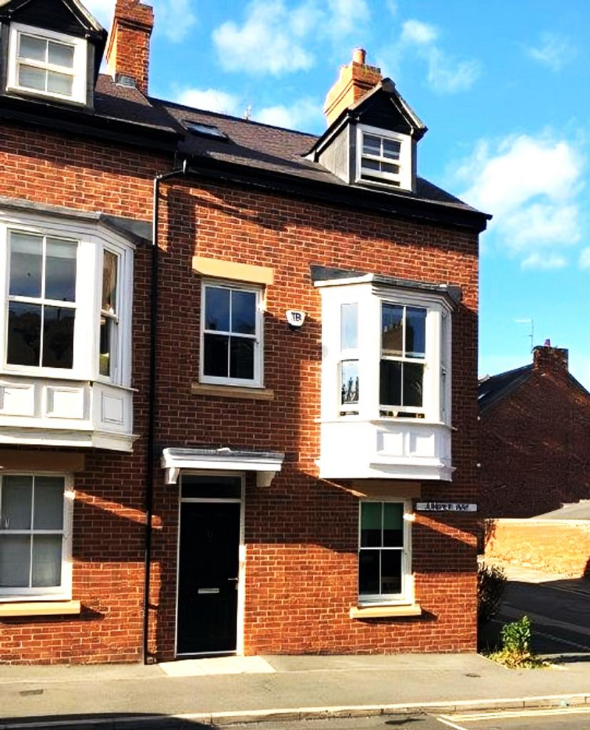A charming exterior view of the property, showc...