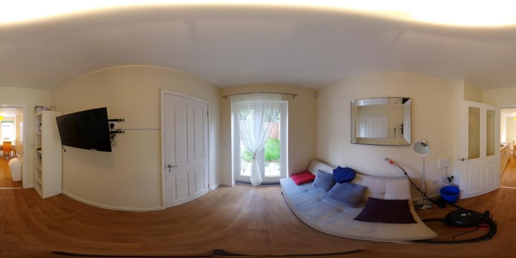 A bright and inviting living room with a comfor...