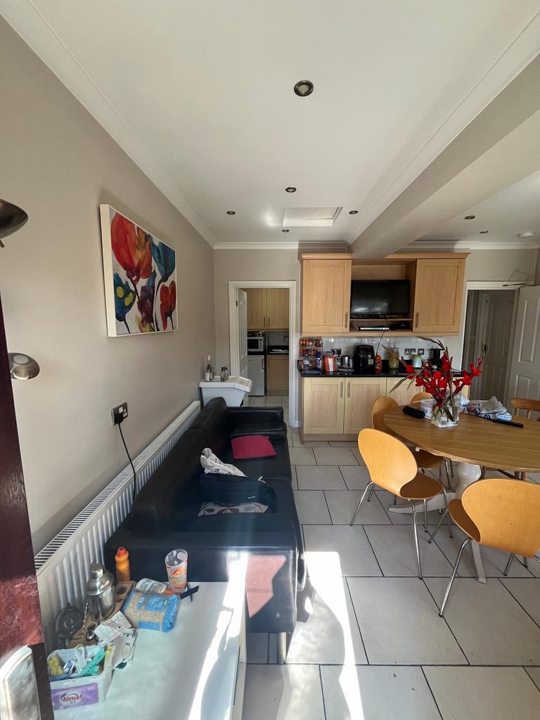 Bright and spacious kitchen area featuring mode...