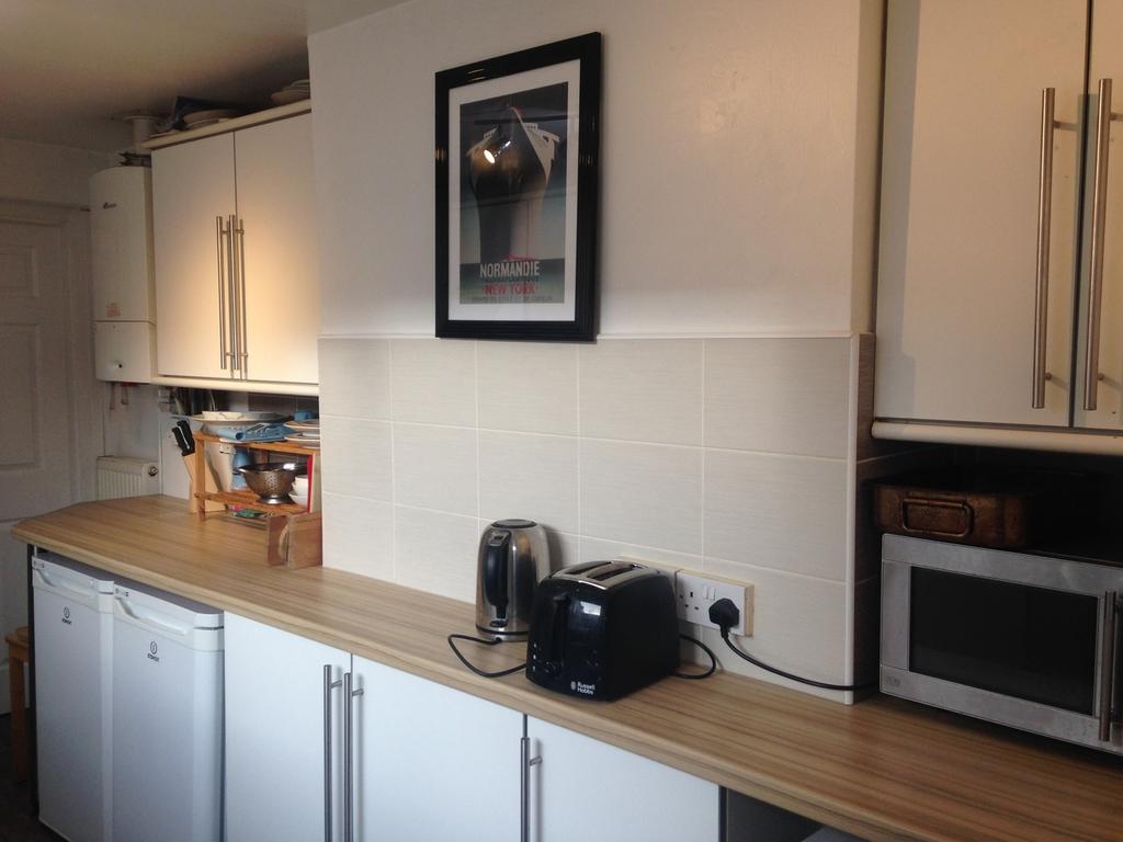 This well-maintained kitchen features modern ap...
