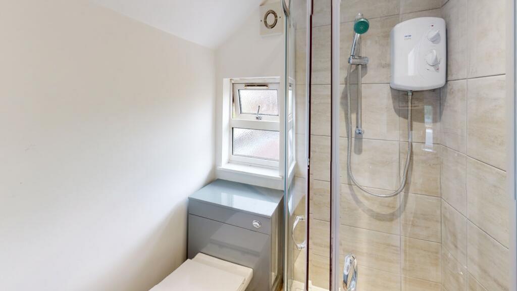 A modern, well-maintained bathroom featuring a ...