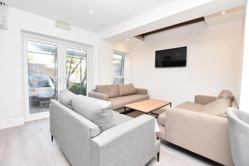 A beautifully designed living room featuring mo...