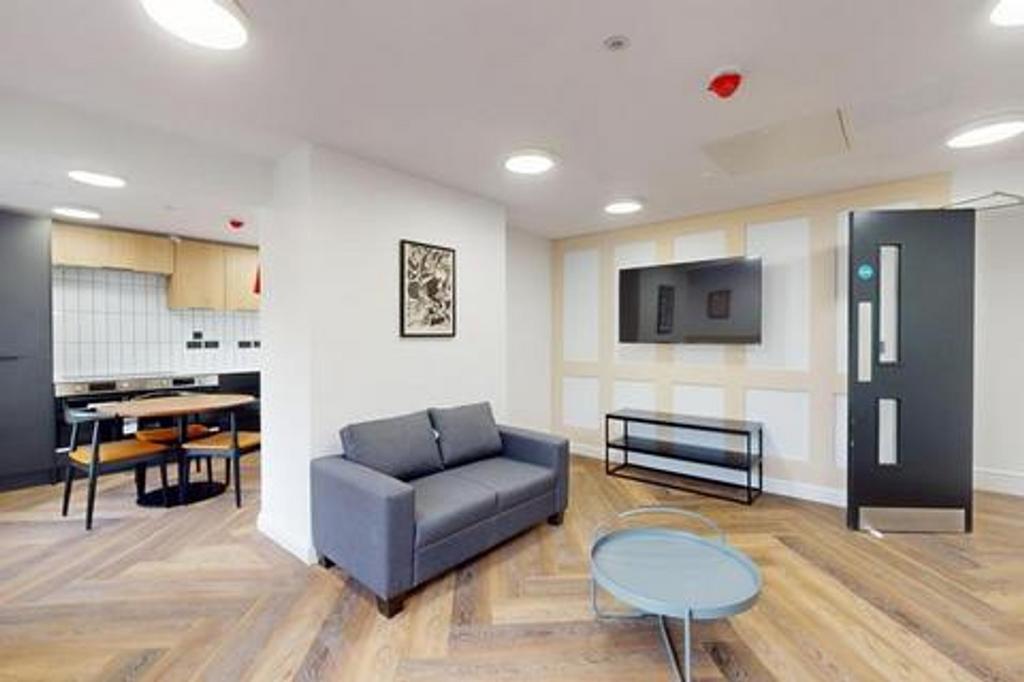A stylish and spacious modern living room, perf...