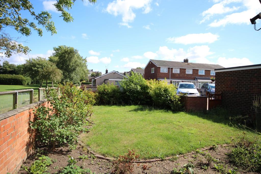 A charming garden space featuring well-maintain...