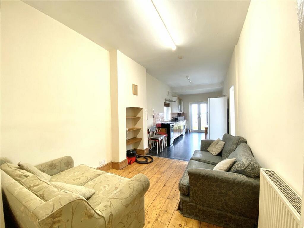 Spacious living area featuring comfortable seat...